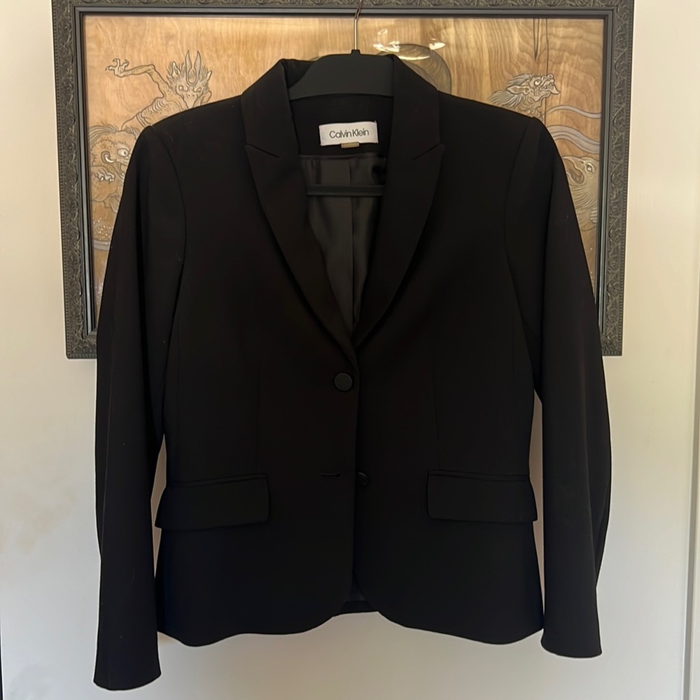 Classic 2 button black blazer. Mint condition.
